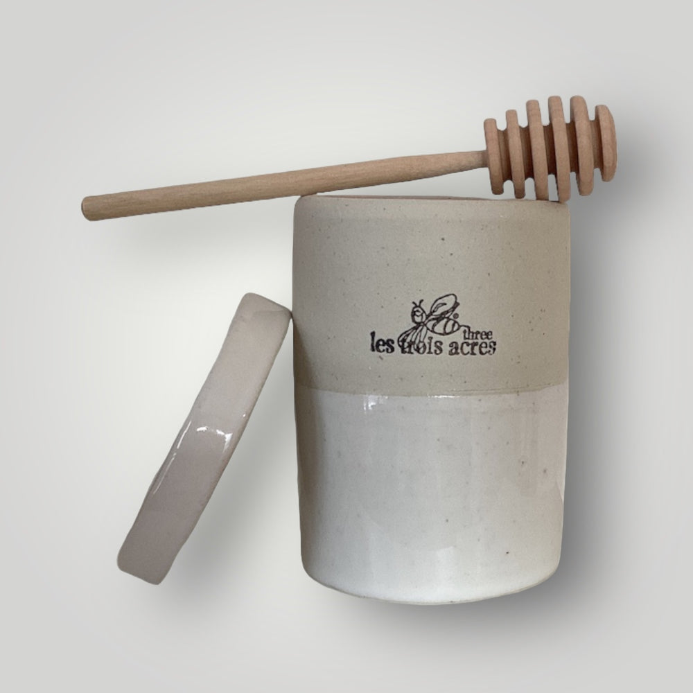 Honey pot with wooden stick